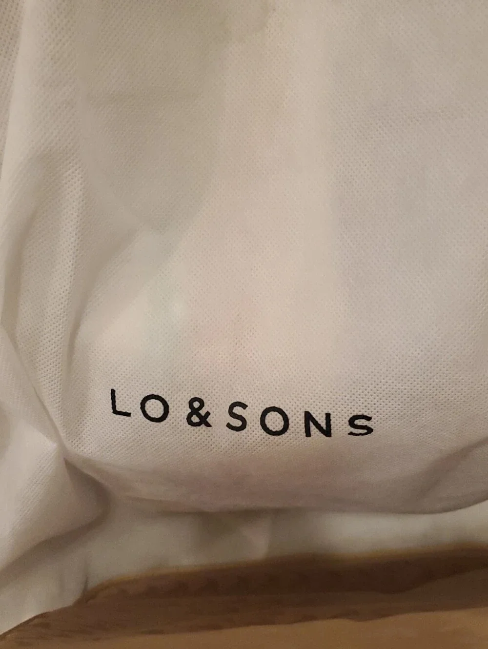 Lo & Sons Black Backpack with Gold Zipper Accents